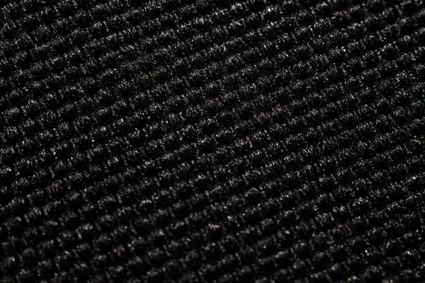 Gros plan de fond texture tissu noir . — Photo