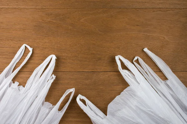 Witte Plastic Zak Houten Ondergrond Reduceer Het Concept Van Hergebruik — Stockfoto