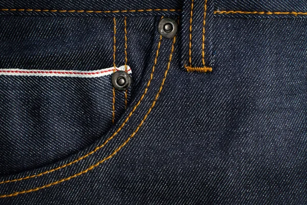 Mørkeblå Jeans Tekstur Baggrund Med Rød Selvedge Lomme Nitter - Stock-foto