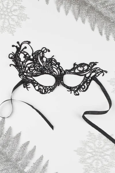 Beautiful carnival black mask and christmas decoration on white background . Christmas concept. — Stock Photo, Image