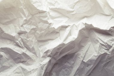 Arkaplan ve doku kopyalama alanı için beyaz buruşmuş kağıt