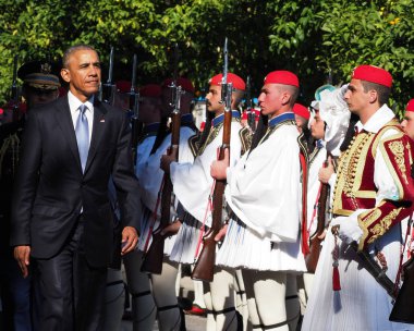 US President Barack Obama reviews the Presidential Guard in Athe clipart