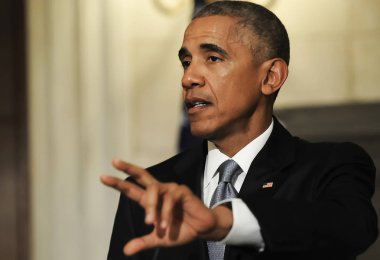President Barack Obama speaks during a joint news conference wit clipart