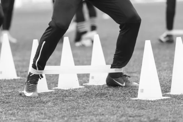 The feet of PAOK players and football training equipment — Stock Photo, Image