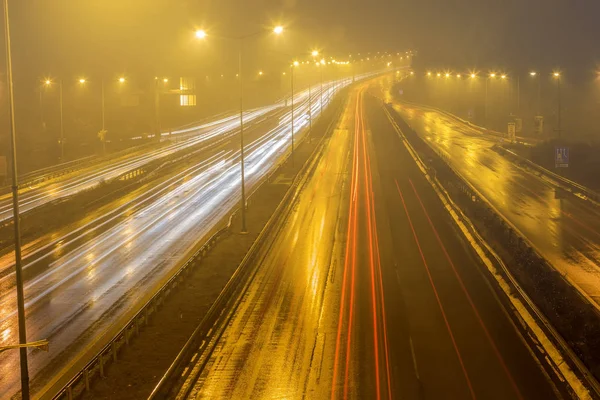 Speed Traffic - light trails on motorway highway at night — Stock Photo, Image