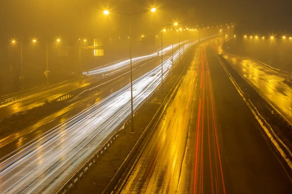 Speed Traffic - light trails on motorway highway at night — Stock Photo, Image