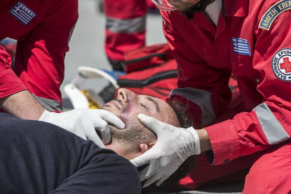 First aid, victim liberation in an car accident — Stock Photo, Image