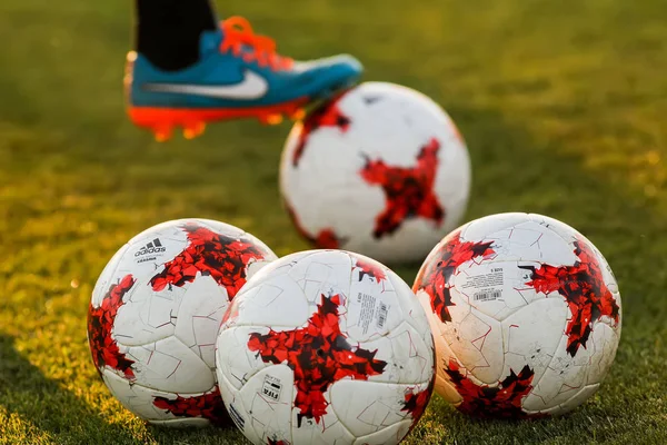 Football balls on the pitch — Stock Photo, Image
