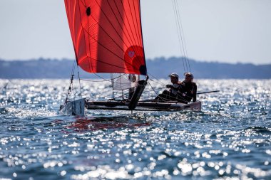 Sporcular Yatlar eylem sırasında 