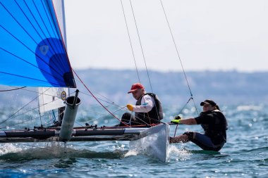 Sporcular Yatlar eylem sırasında 