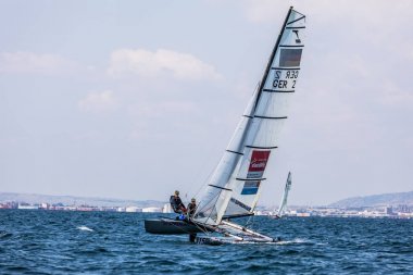 Sporcular Yatlar eylem sırasında 