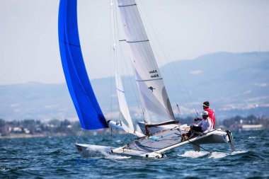 Sporcular Yatlar eylem sırasında 