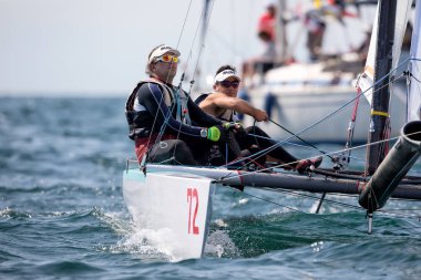 Sporcular Yatlar eylem sırasında 