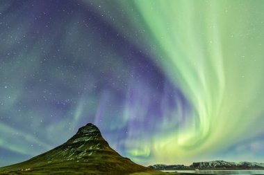 Northern Light Aurora borealis at Kirkjufell Iceland with fully  clipart