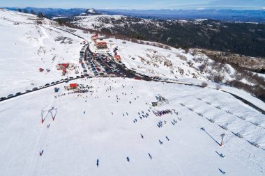 Aerial View of skiers at Ski Resort Vasilitsa in the mountain ra clipart