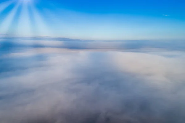 Aerial View. Flying over the clouds . — Stock Photo, Image