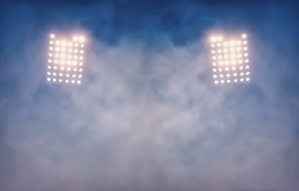 Luces del estadio y humo contra el fondo oscuro del cielo nocturno —  Fotos de Stock