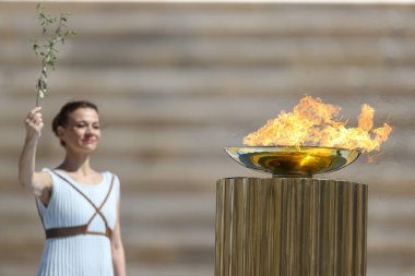 Athens, Greece - March 19, 2020: Olympic Flame handover ceremony for the Tokyo 2020 Summer Olympic Games at the Panathenaic Kallimarmaro Stadium clipart