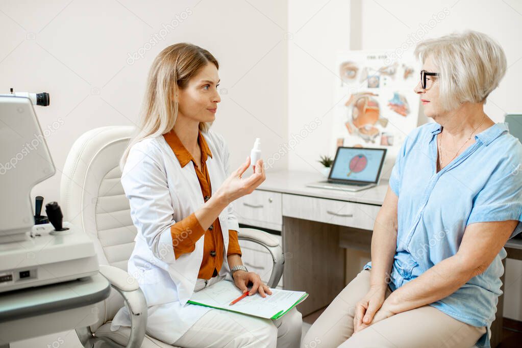 Senior patient with ophthalmologist in the office