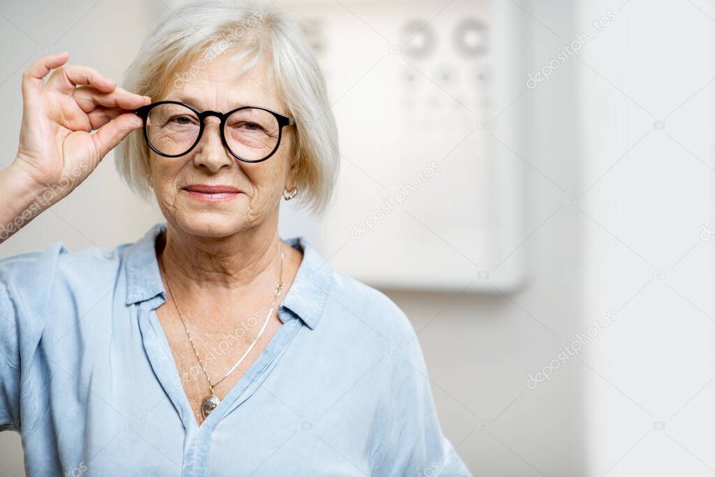 Portrait of a senior woman with eyeglasses in medical office