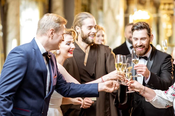 Elegant people during a celebration indoors — ストック写真