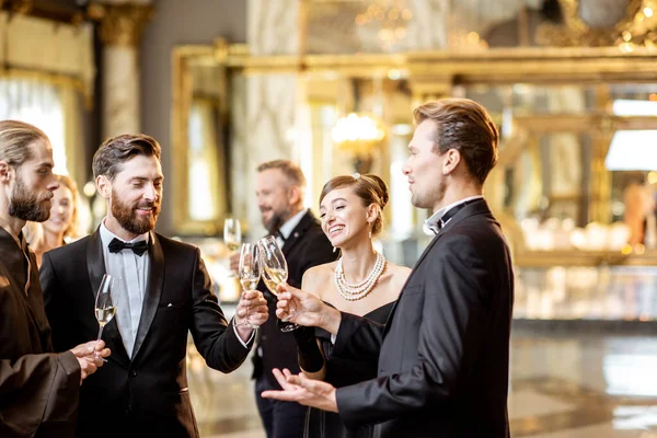 Elegant people during a celebration indoors — ストック写真