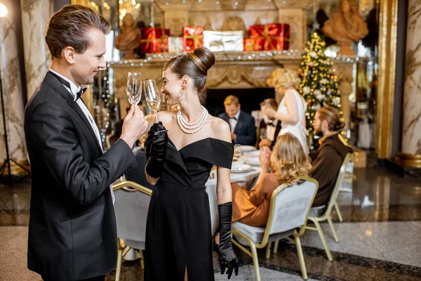 Elegant couple celebrating New Year holiday Royalty Free Stock Photos