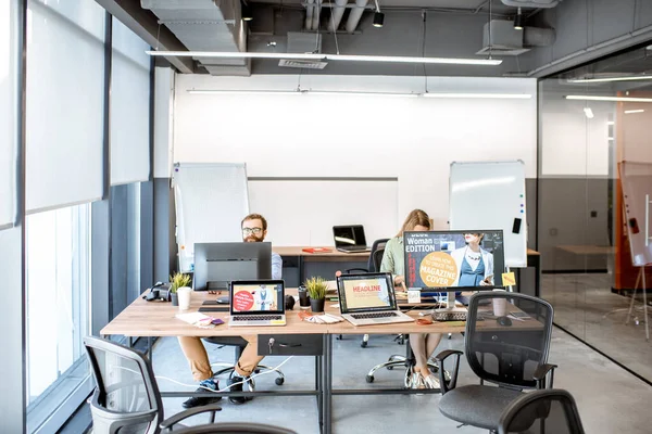 Web designers working at the office — Stock Photo, Image