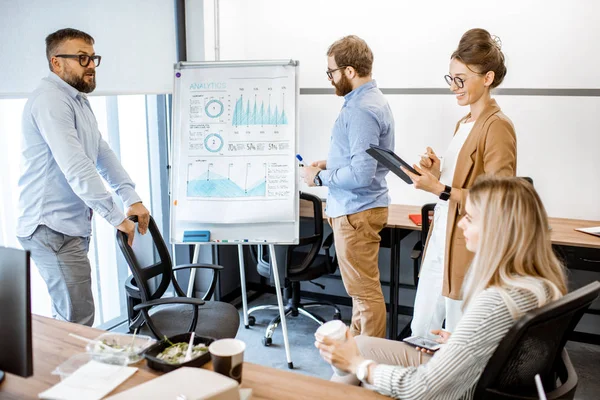 Colleagues during a conference in the office — Stockfoto