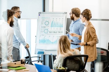 Colleagues during a conference in the office