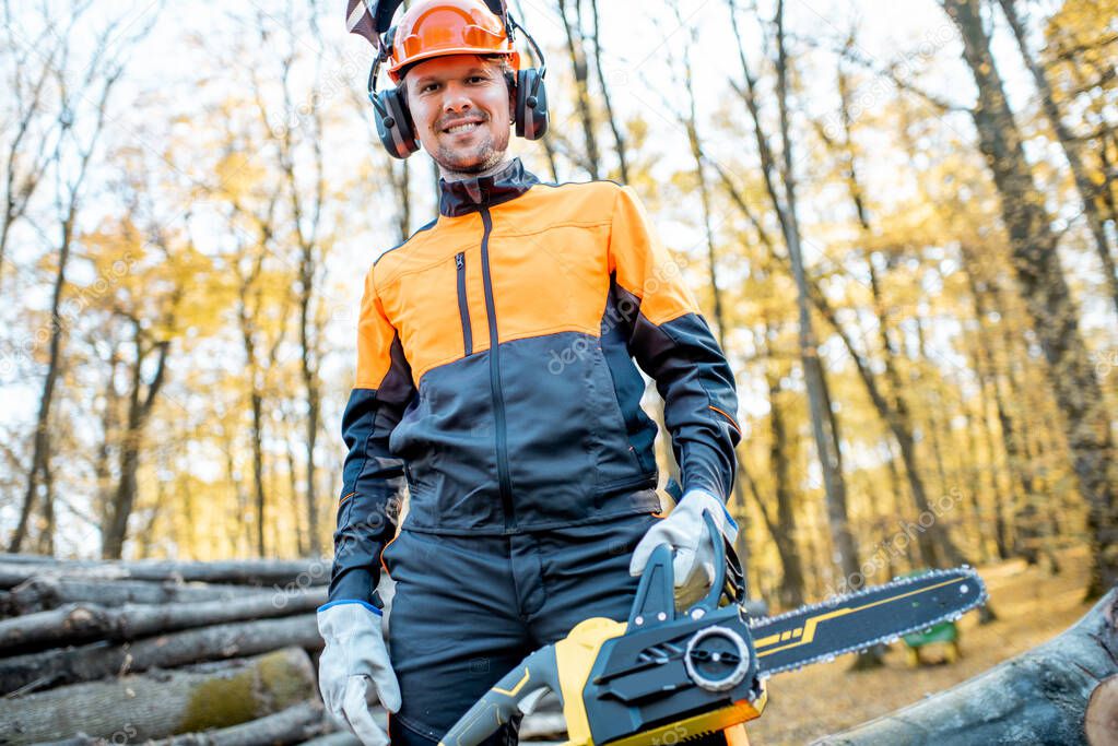 Professional lumberjack in the forest