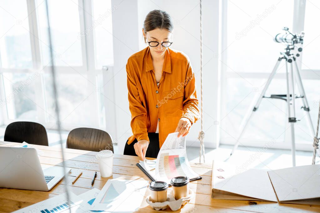 Young woman working at the office