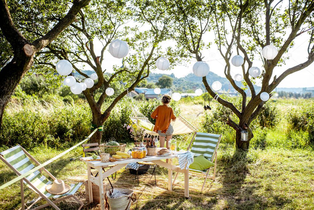 Beautifully decorated yard with dinner place