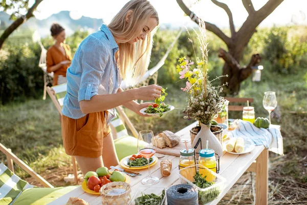 Woman on a picnic in the garden — Stock Photo, Image