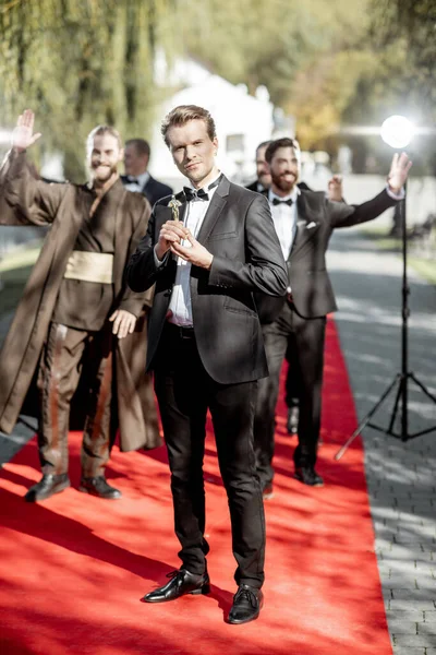 Movie actors on the red carpet outdoors — Stock Photo, Image