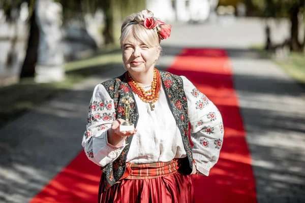 Woman in ukrainian national dress on the red carpet