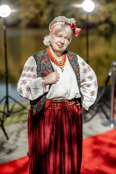 Woman in ukrainian national dress on the red carpet