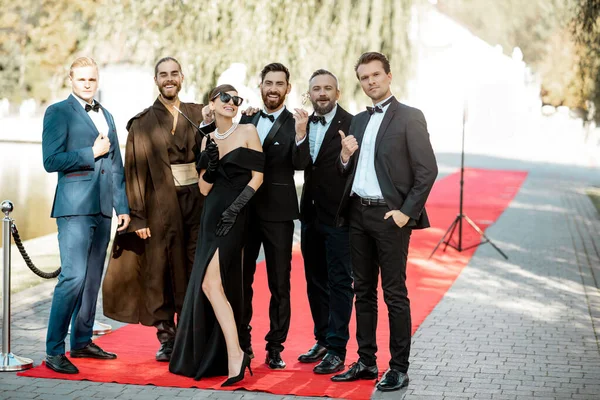 Movie actors on the red carpet outdoors — Stock Photo, Image