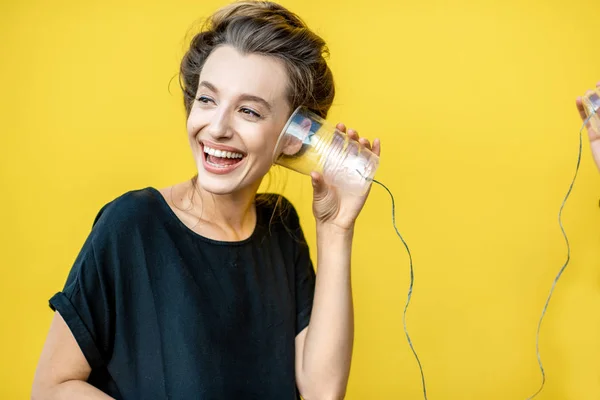 Man and woman talking with string phone — Stock Photo, Image