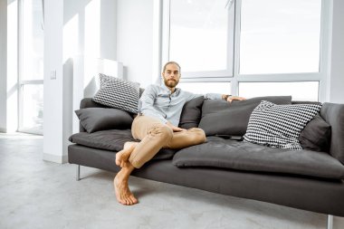 Man on the couch at home