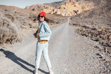 Carefree woman on the dessert valley