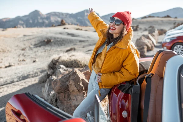 Carefree woman traveling by car — Stock Photo, Image