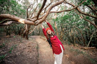 Woman traveling in the forest