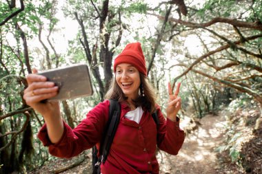 Woman traveling in the rainforest