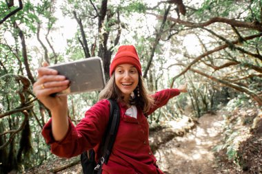 Woman traveling in the rainforest