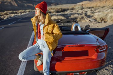Woman enjoying roadtrip