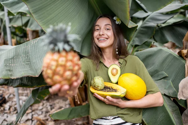 Woman with exotic food outdoors — Stok fotoğraf