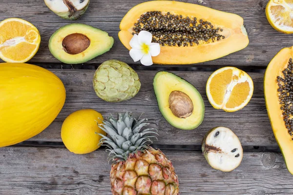 Exotic fruits and berries on the woooden table — 图库照片