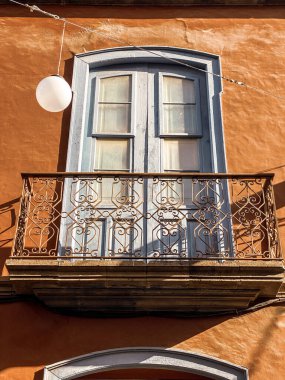 Architectural fragment of the old building in colonial style