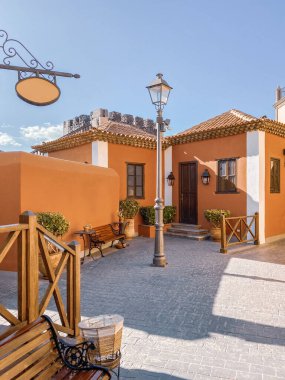 Streev view with beautiful colorful buildings in Los Cristianos, Spain